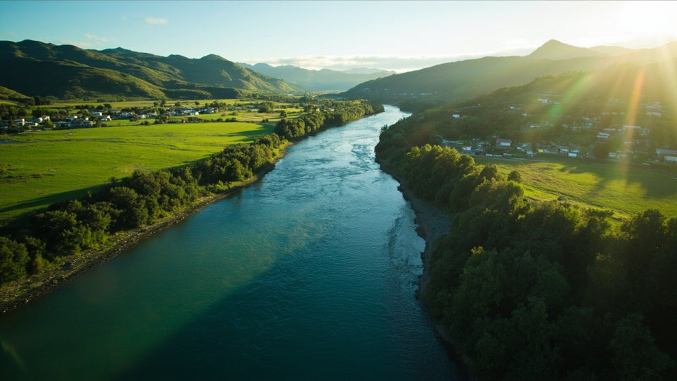Aerial view of New Zealand river and farmland